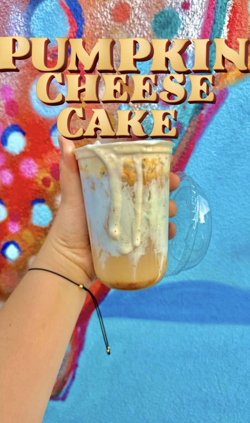 She'Brews Pumpkin Cheesecake drink dripping with cheesecake cold foam, the top-selling coffee